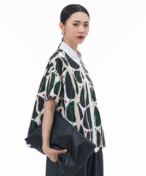 Contrasting Print Blouse