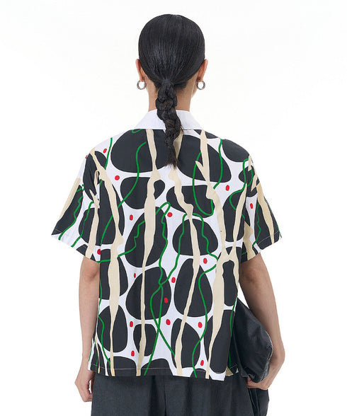 Contrasting Print Blouse