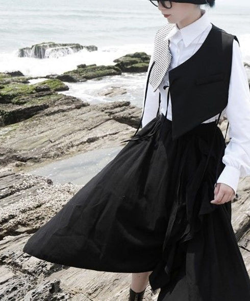 Check x black asymmetric vest