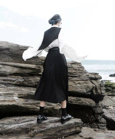 Check x black asymmetric vest